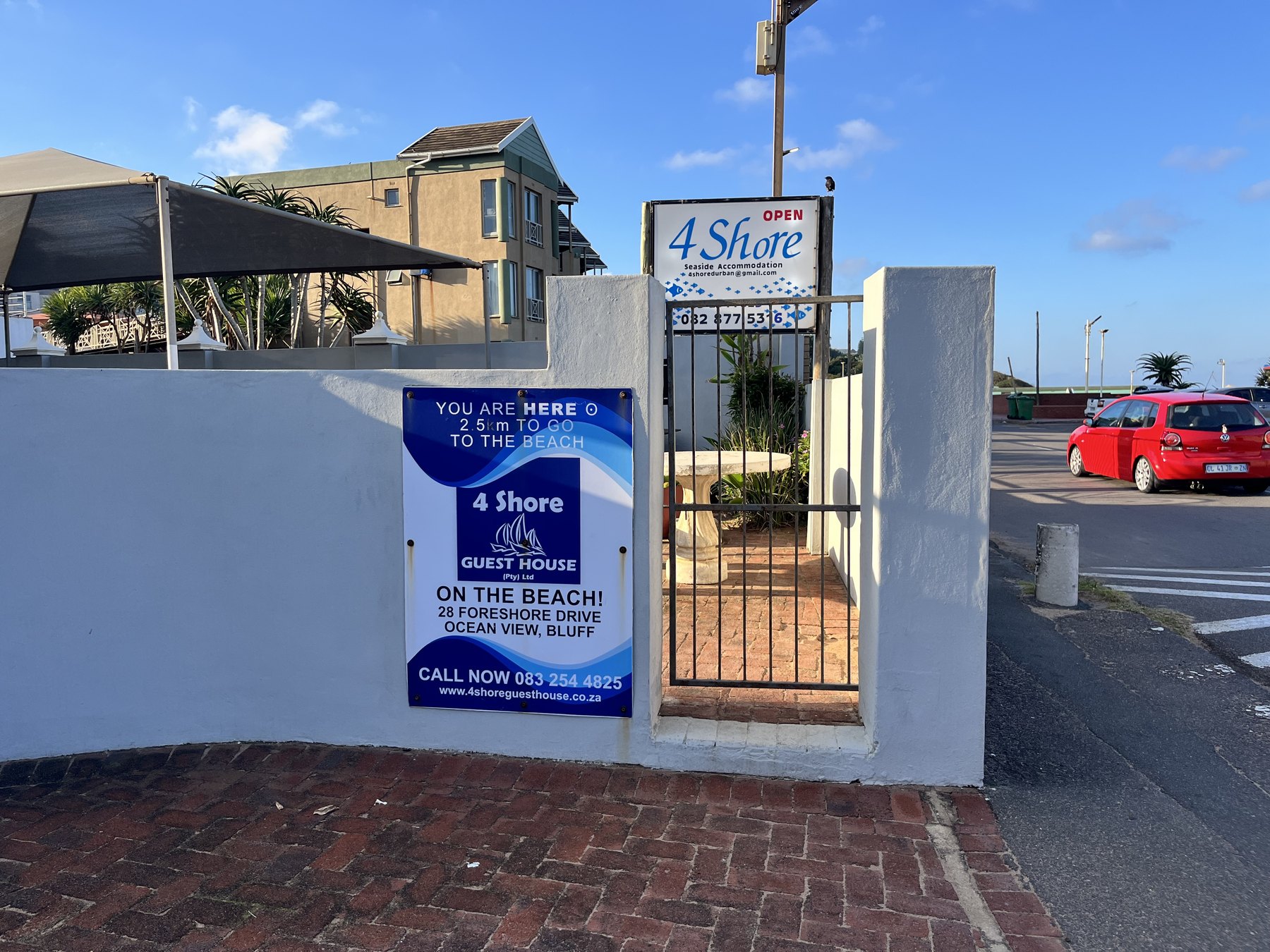 4Shore Guesthouse entrance gate and sign on Foreshore Drive
